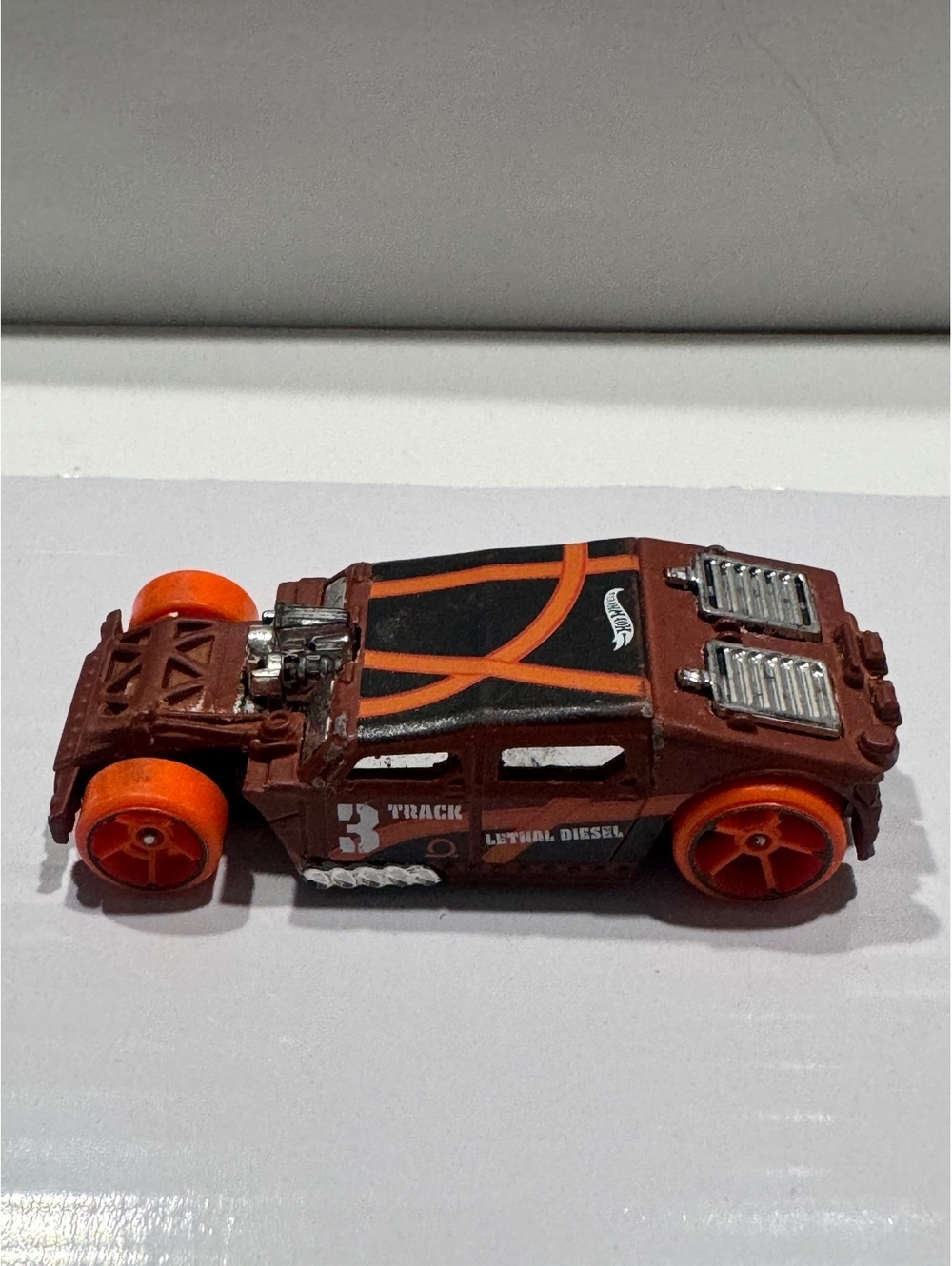 Hot Wheels 2021 Lethal Diesel Track Stars Brown/Orange